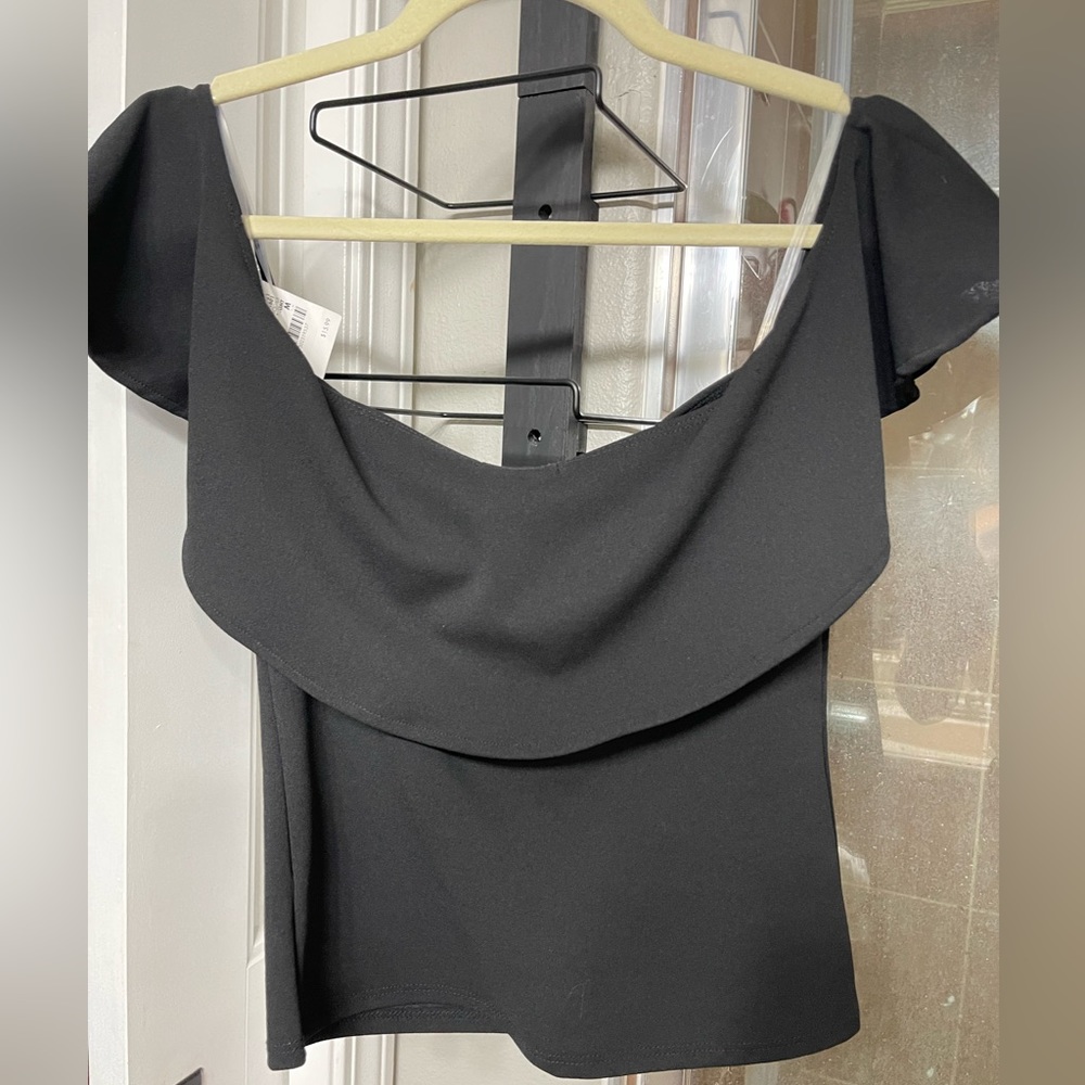 Off the shoulder, black top
